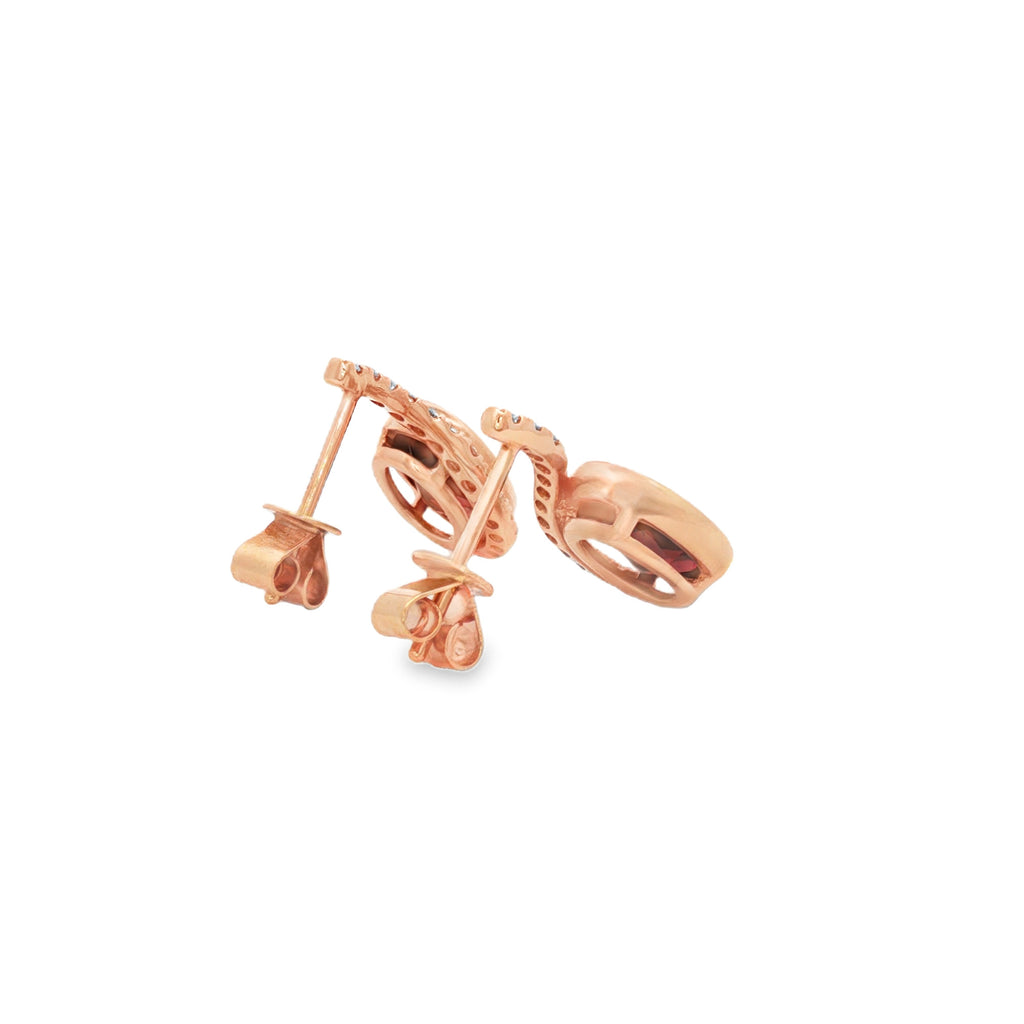 ARETES CON GRANATE OVAL Y DIAMANTES