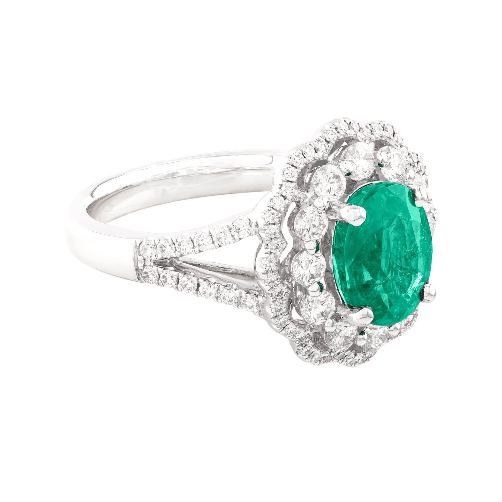 ANILLO DIVIDIDO CON ESMERALDA Y DIAMANTES
