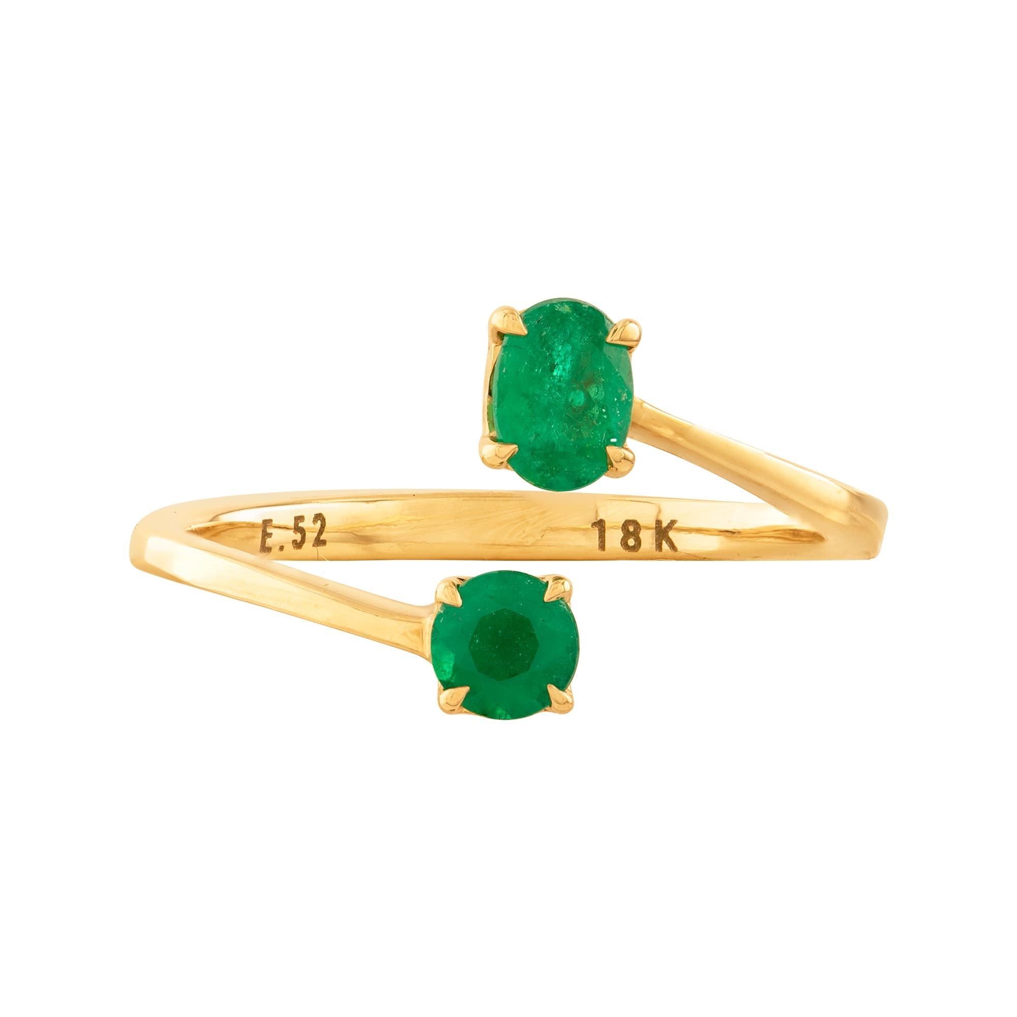 ANILLO CRUZADO CON ESMERALDAS