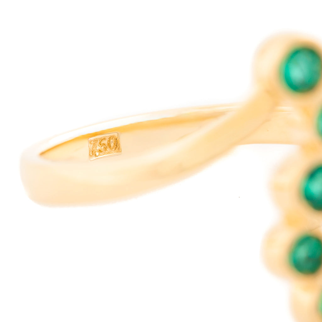 ANILLO CRUZADO CON ESMERALDAS