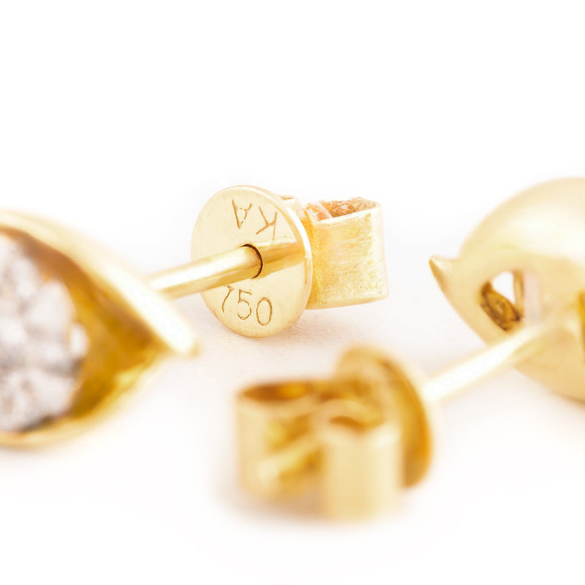 ARETES HOJA Y FLOR CON DIAMANTES