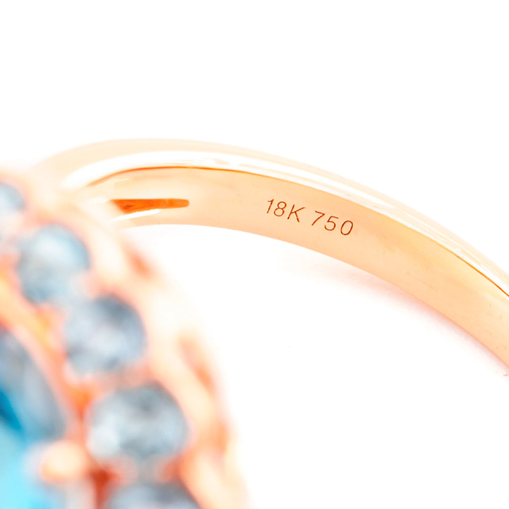 ANILLO FLORAL CON TOPACIO