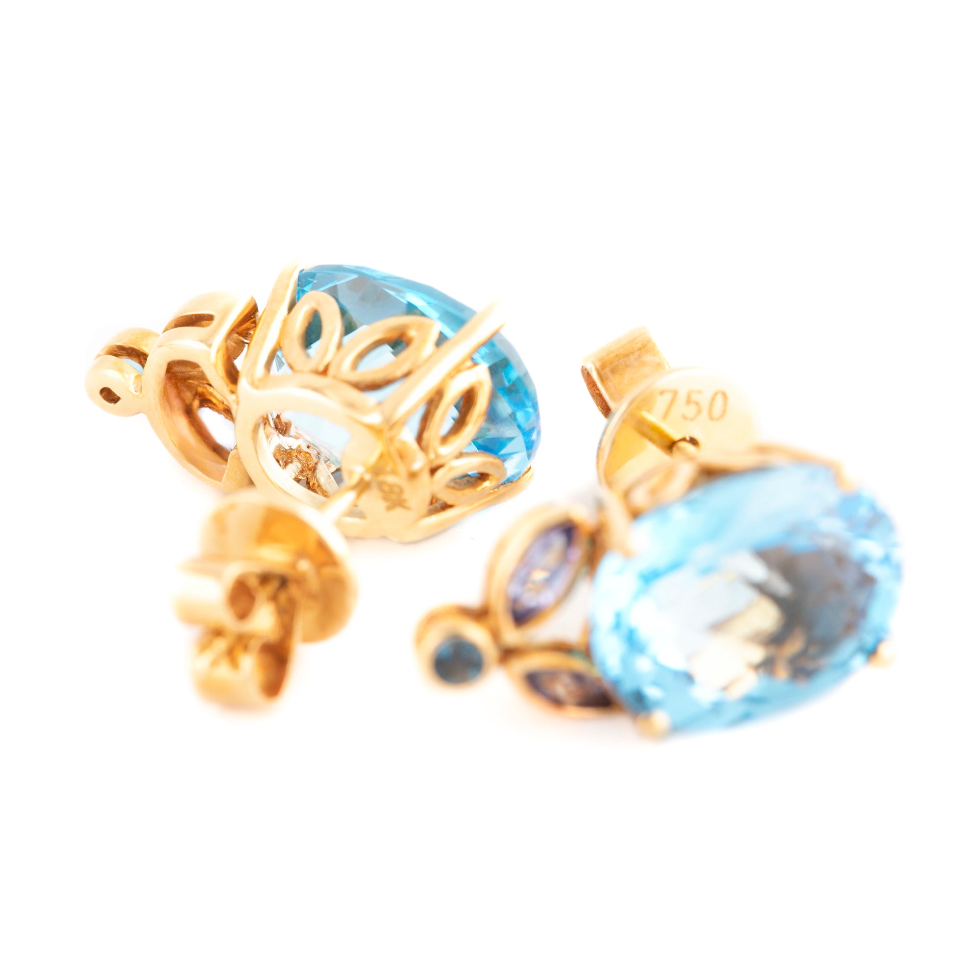 ARETES HOJAS CON TOPACIO OVAL