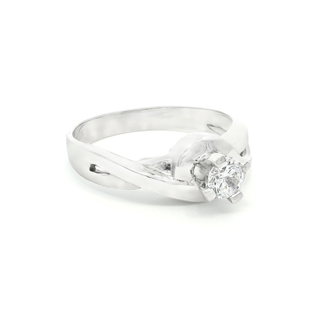 ANILLO SOLITARIO CRUZADO CON ZIRCÓN