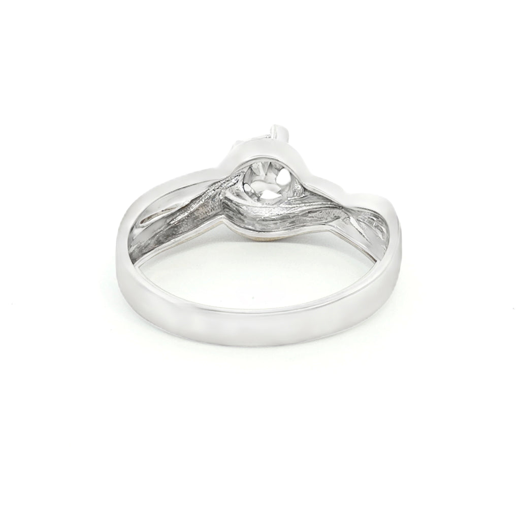 ANILLO SOLITARIO CRUZADO CON ZIRCÓN