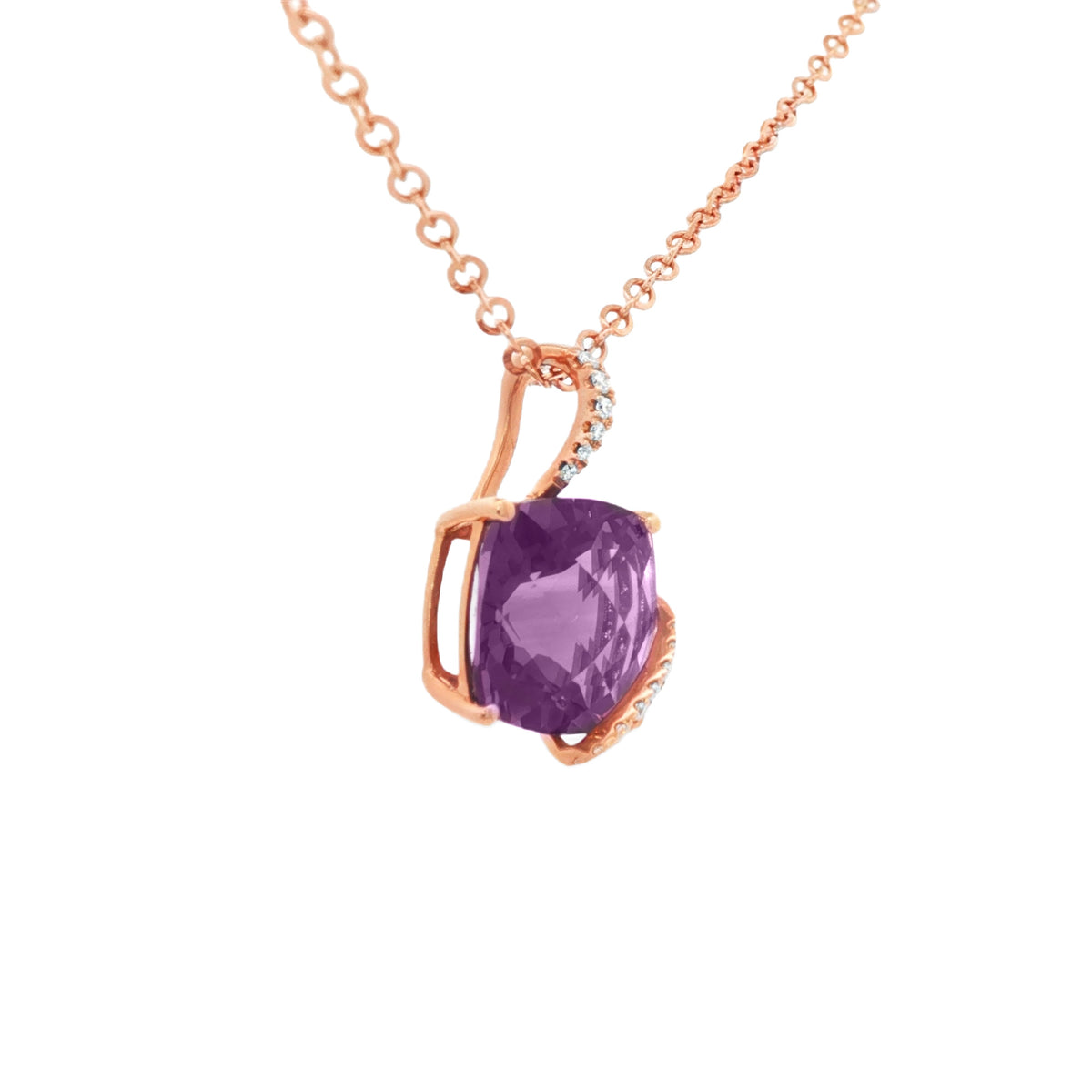 DIJE CON AMATISTA Y DIAMANTES EN ONDA