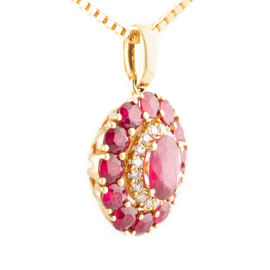 DIJE FLOR DIAMANTES Y PETÁLOS CON RUBÍES