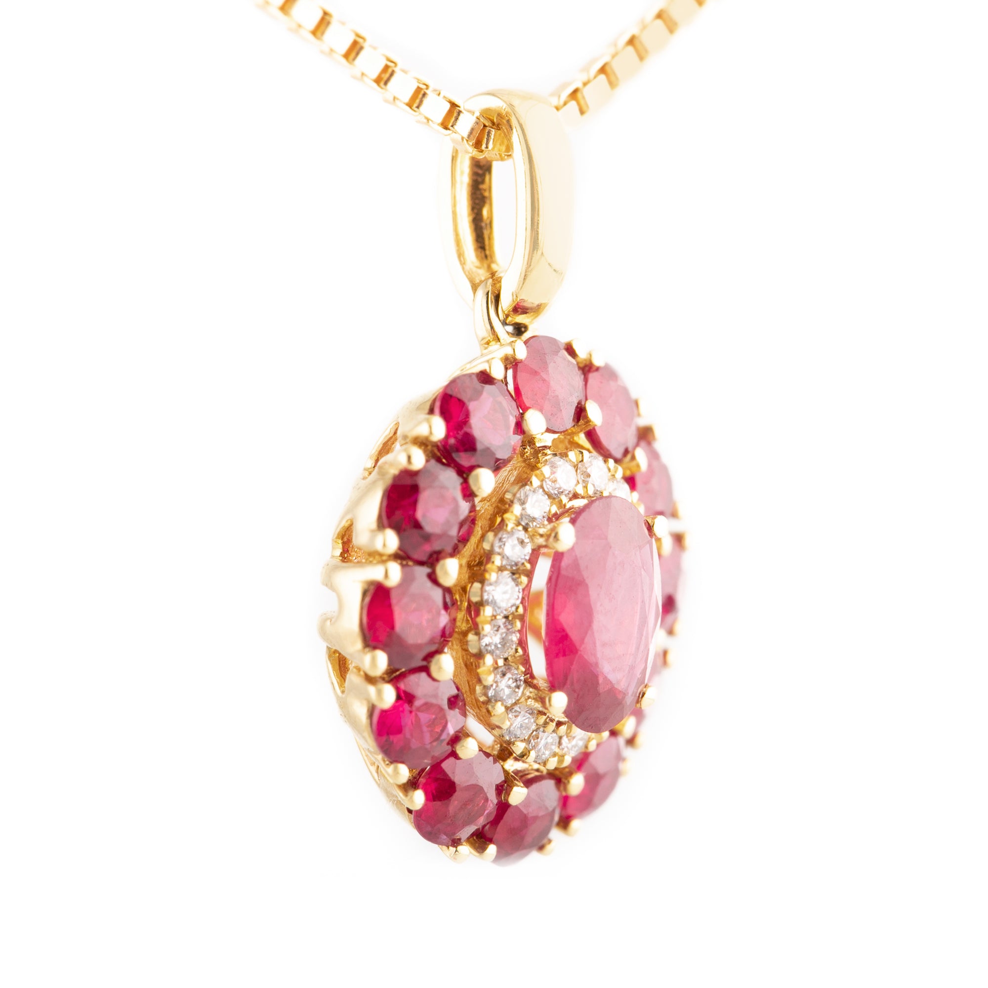 DIJE FLOR DIAMANTES Y PETÁLOS CON RUBÍES