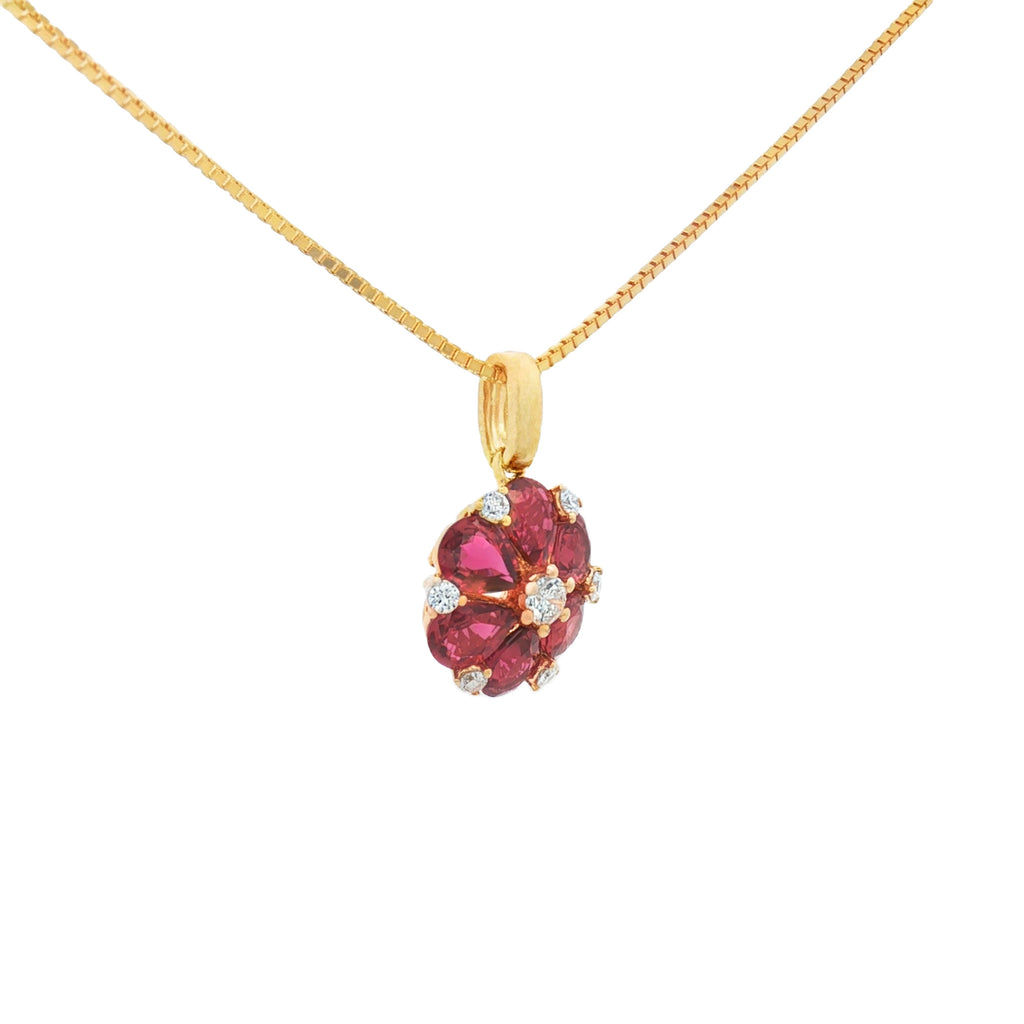 DIJE FLOR DE RUBÍES DIAMANTES