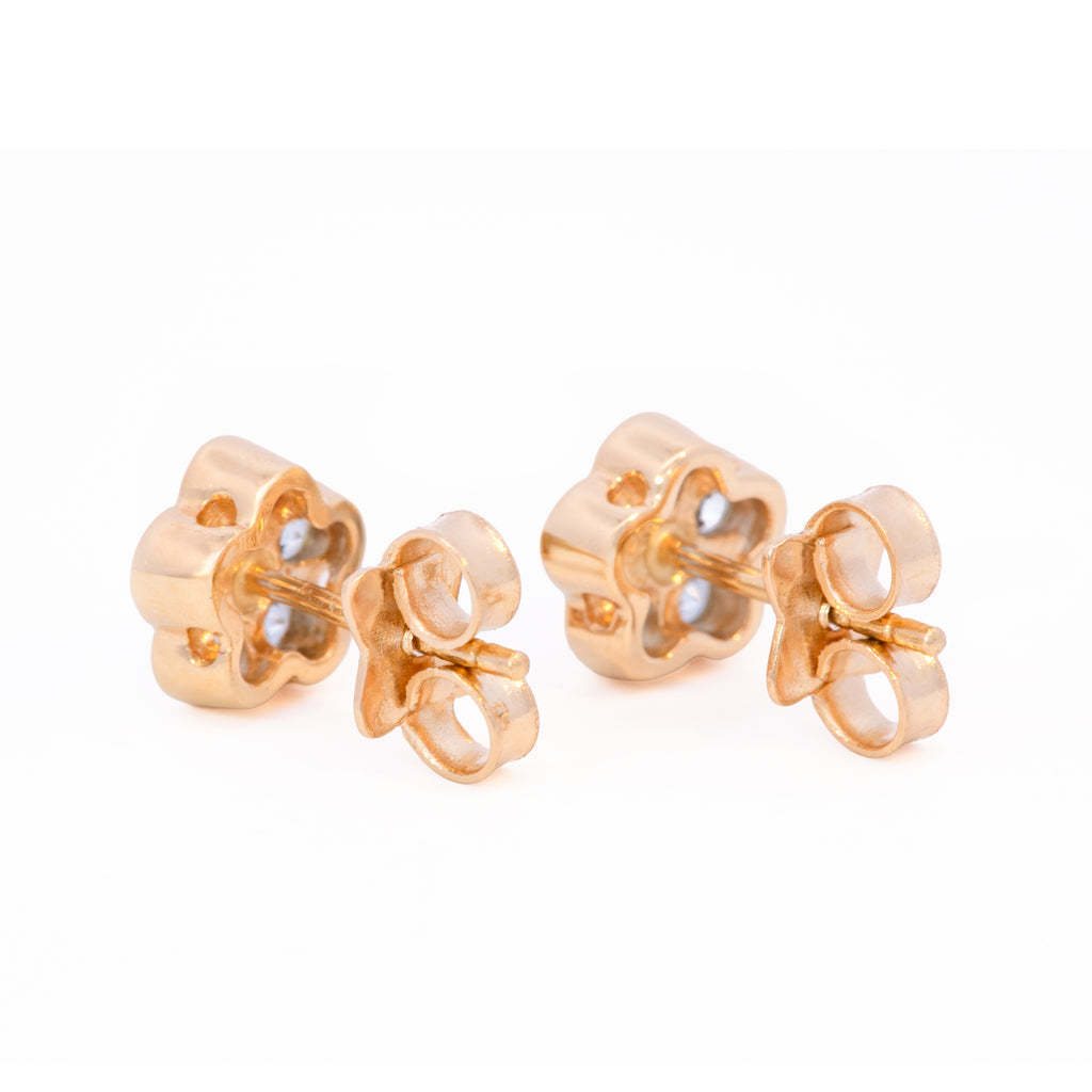 ARETES FLOR ZIRCÓN AZUL