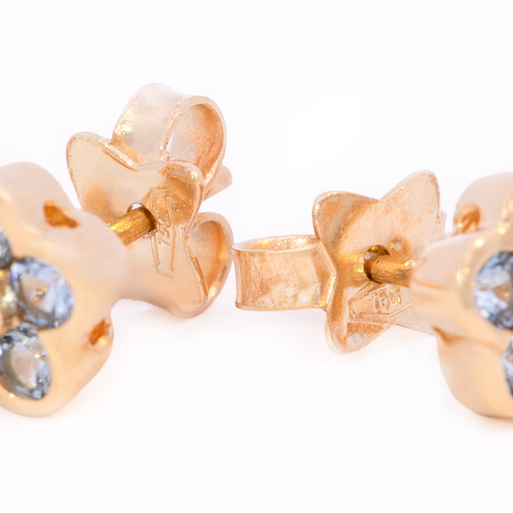 ARETES FLOR ZIRCÓN AZUL