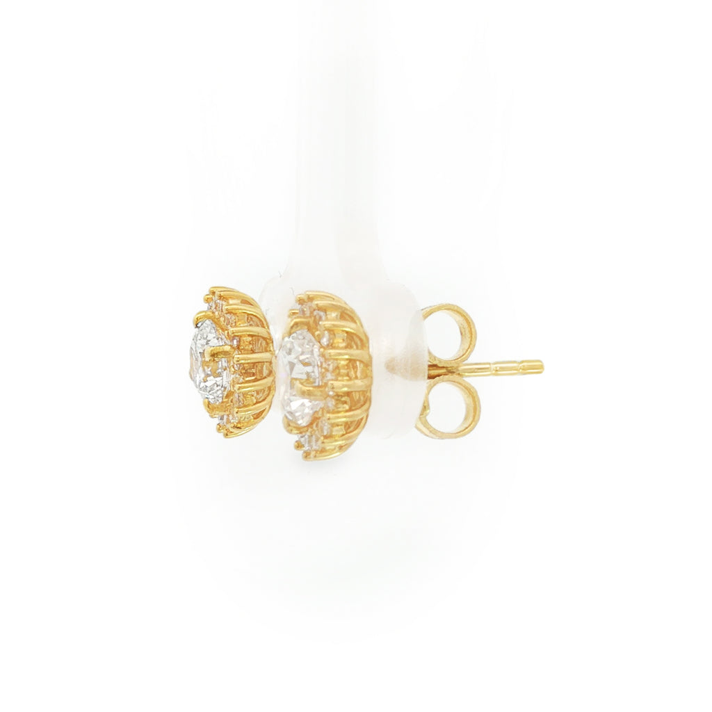 ARETES FLOR PUNTAS ZIRCONES
