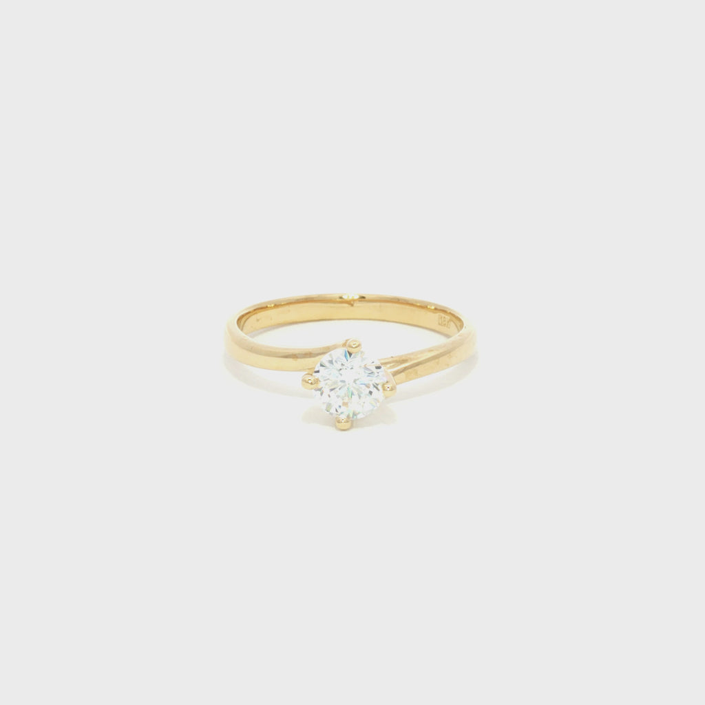 ANILLO SOLITARIO ZIRCÓN CRUZADO