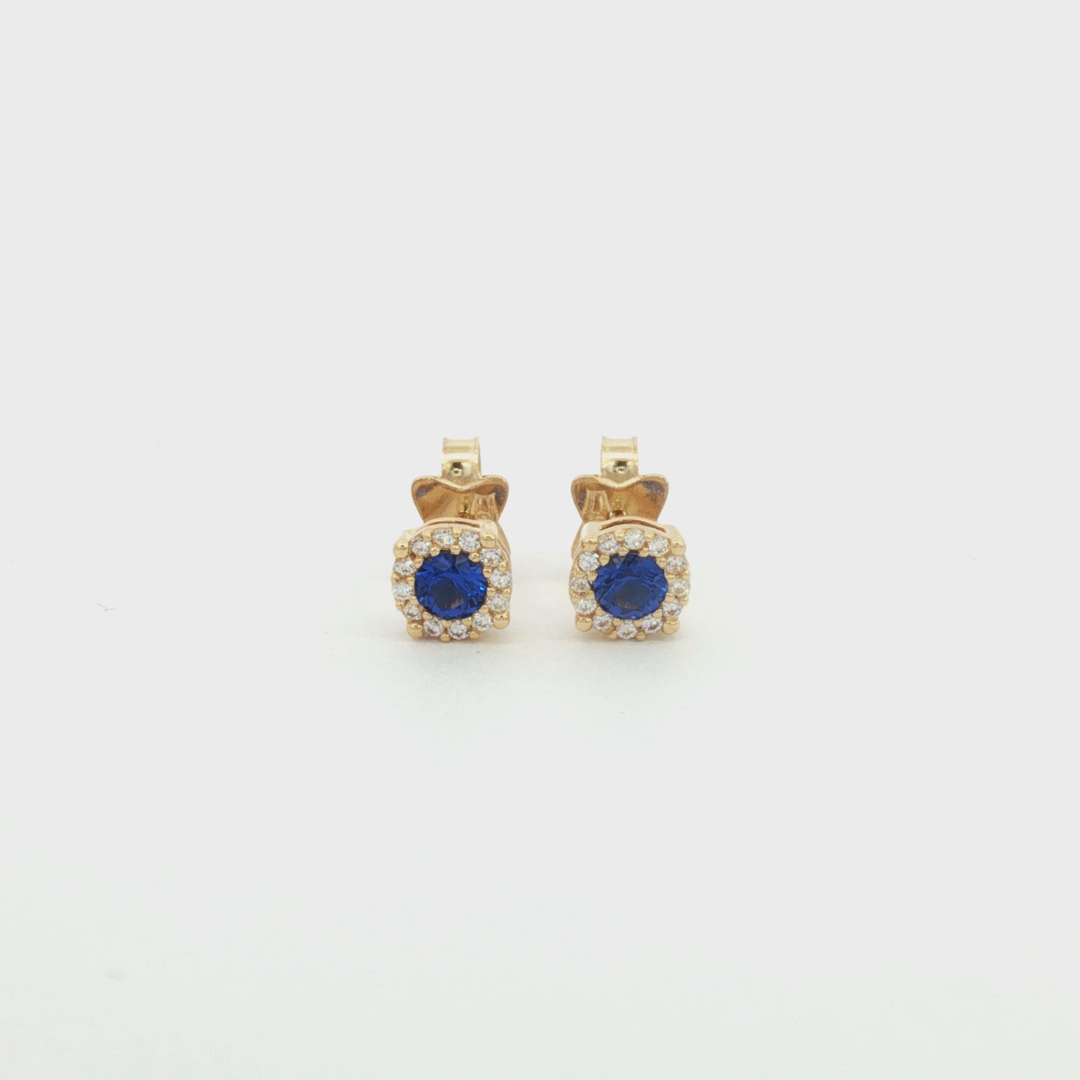 ARETES FLOR ZIRCÓN AZUL