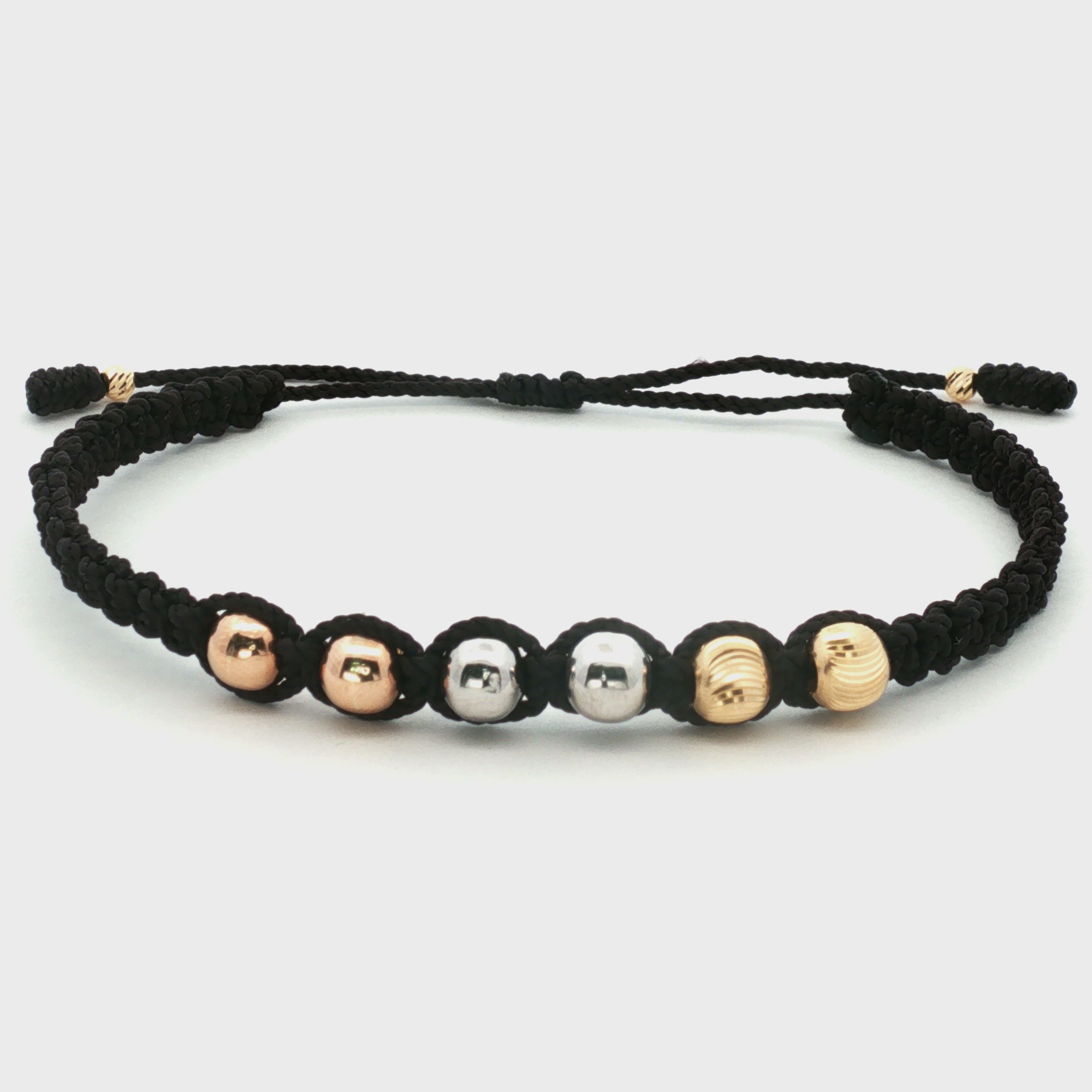 PULSERA HILO NEGRO TRES OROS