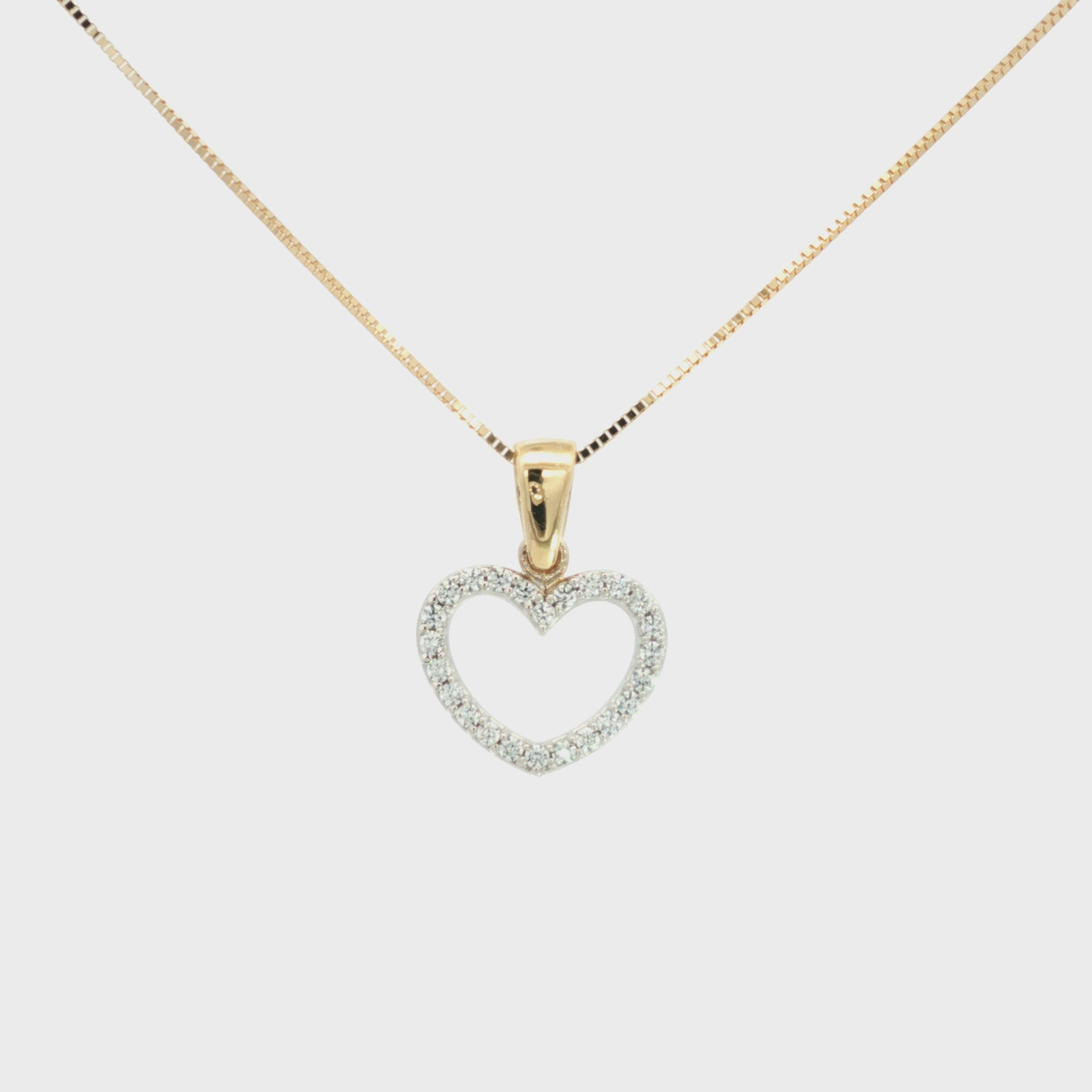 DIJE SILUETA CORAZÓN ZIRCONES