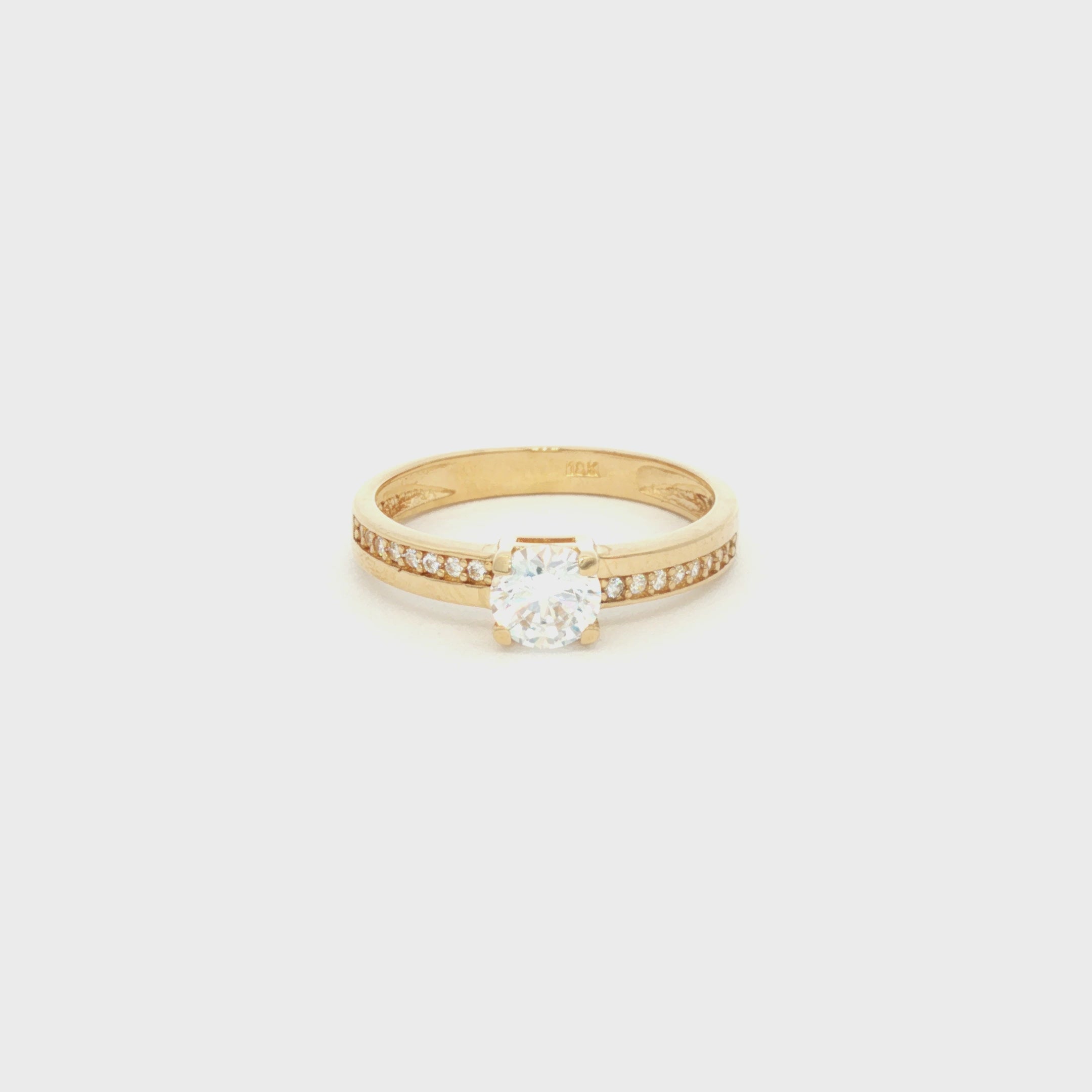 ANILLO ZIRCÓN ADORNADO