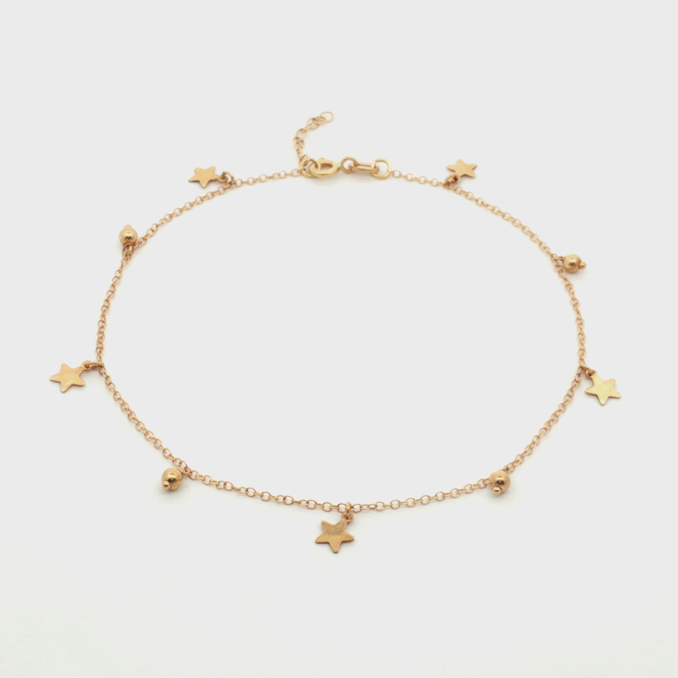 TOBILLERA CON ESTRELLAS Y BOLA