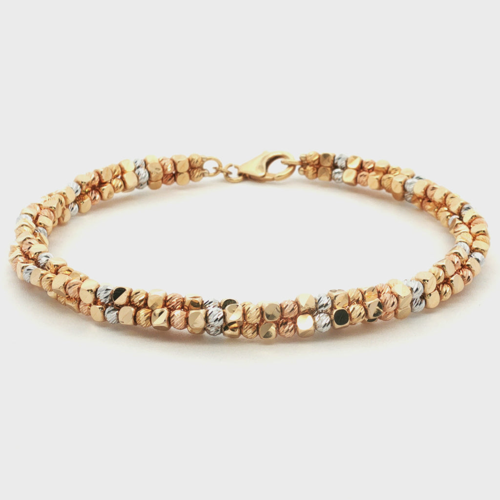 PULSERA ARO ONDA RETORCIDA DADOS