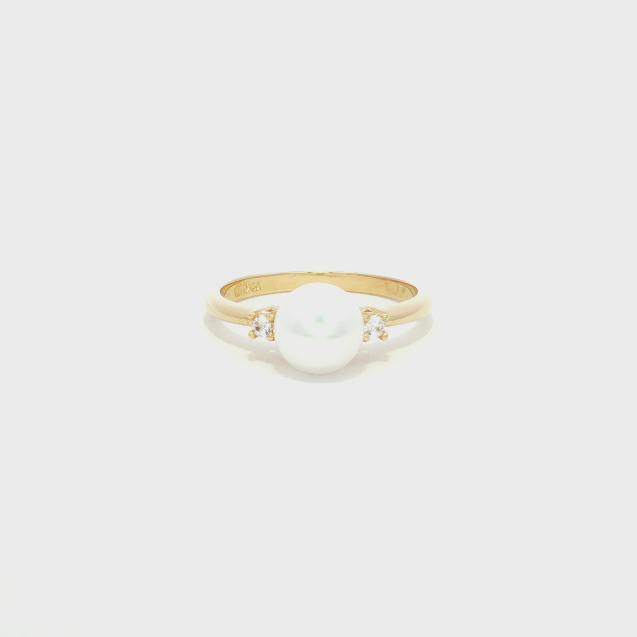 ANILLO CON PERLA Y ZIRCÓN