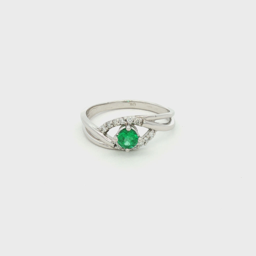 ANILLO SOLITARIO CRUZADO ESMERALDA Y DIAMANTES