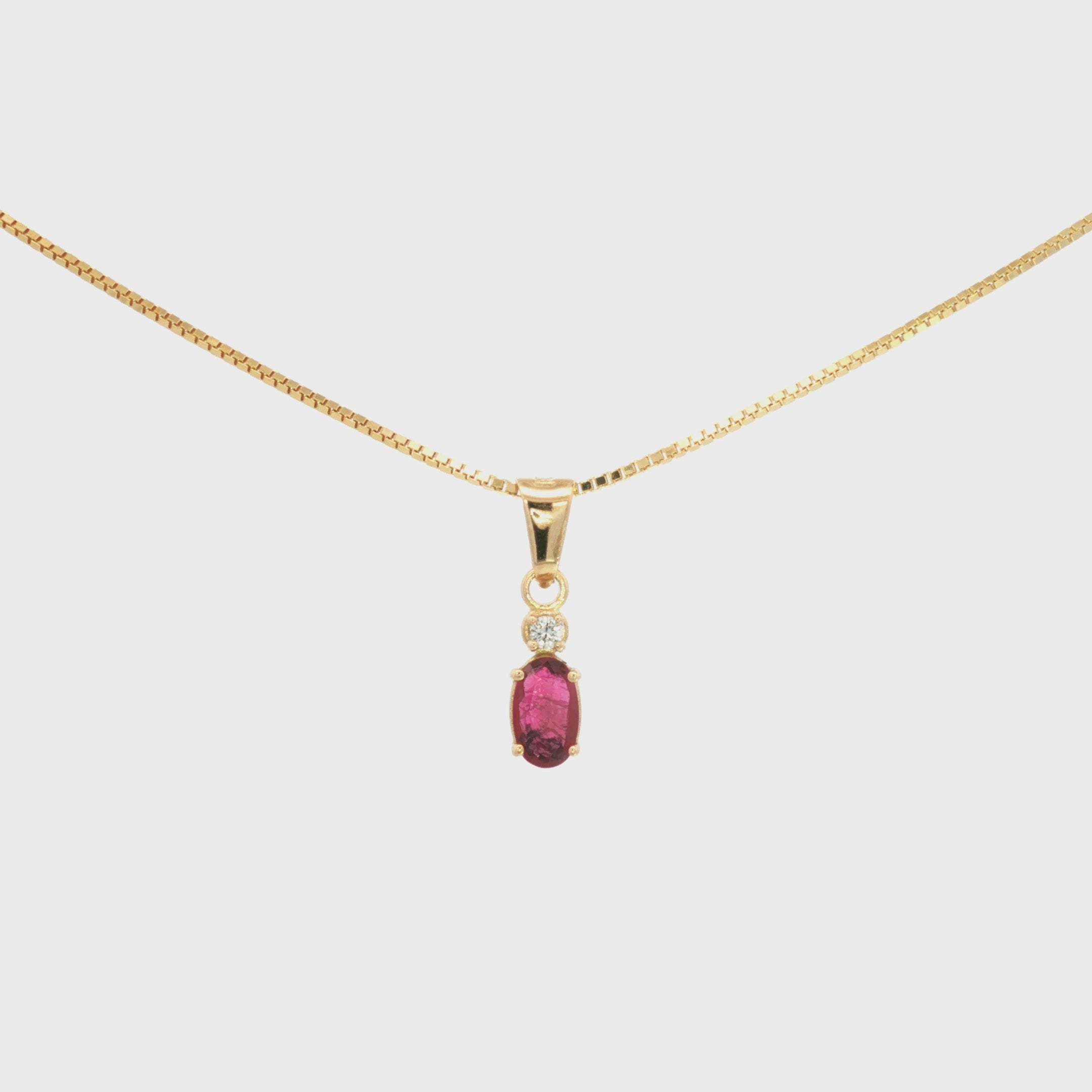 DIJE RUBÍ OVAL CON DIAMANTE