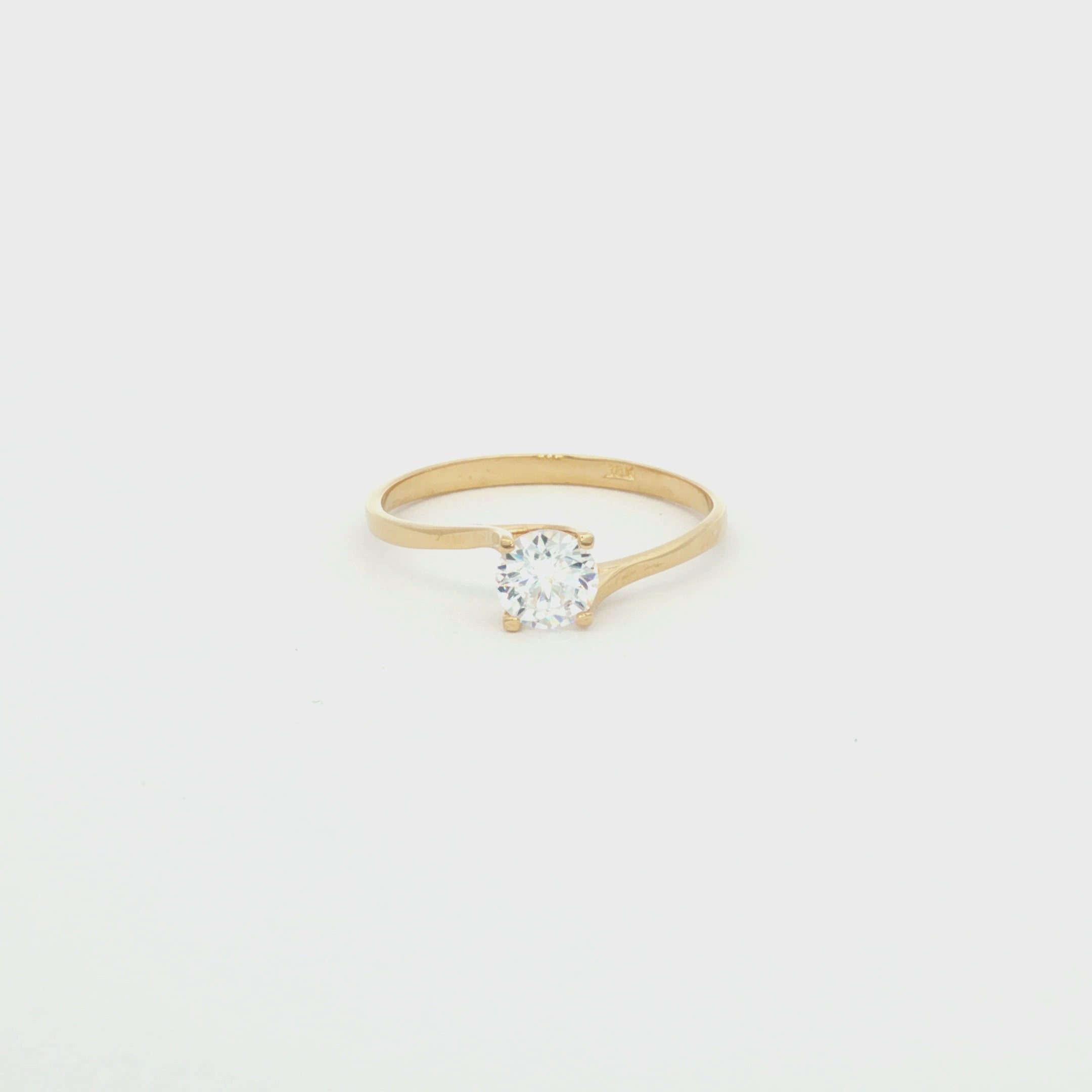 ANILLO ZIRCÓN CRUZADO