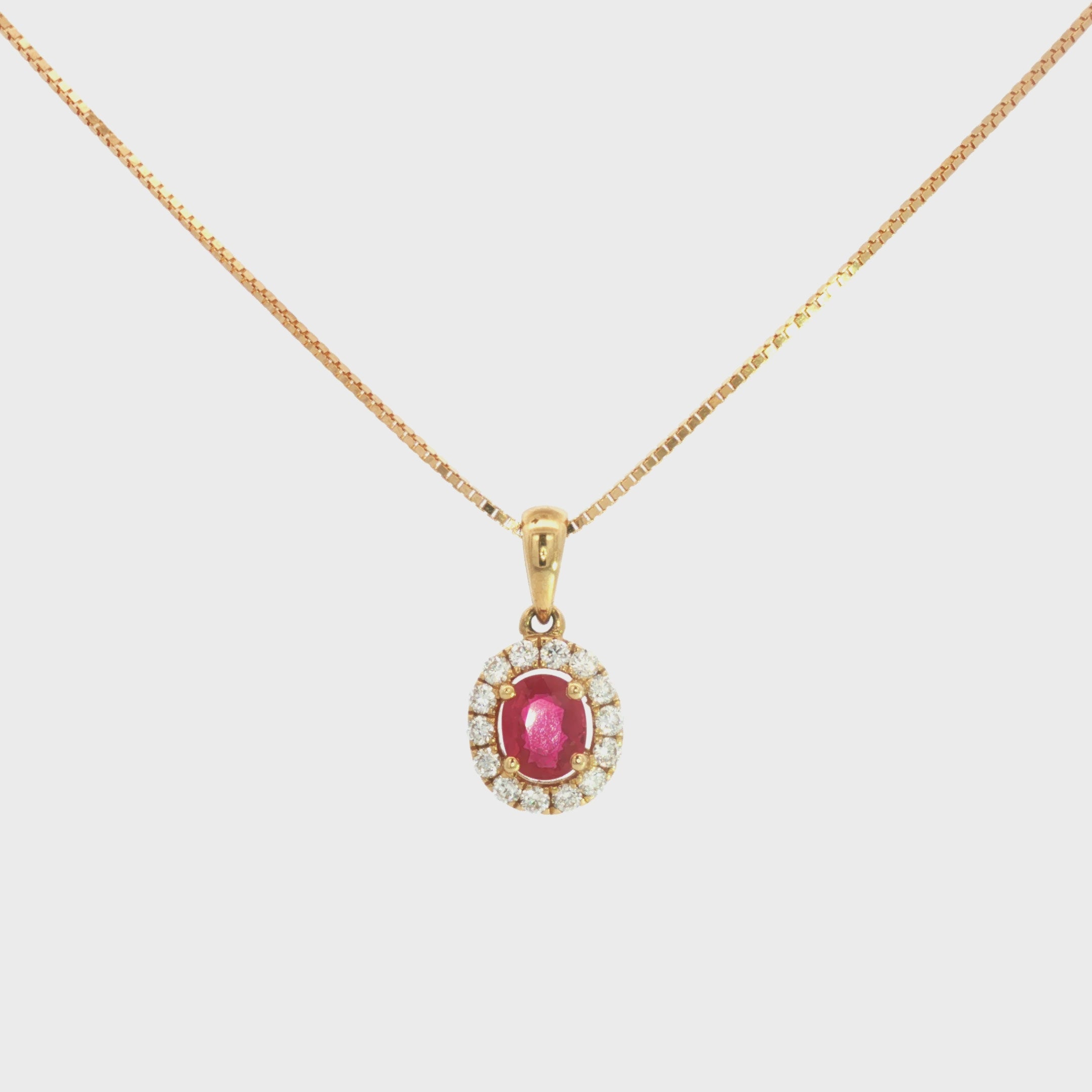 DIJE RUBÍ OVAL CON DIAMANTES