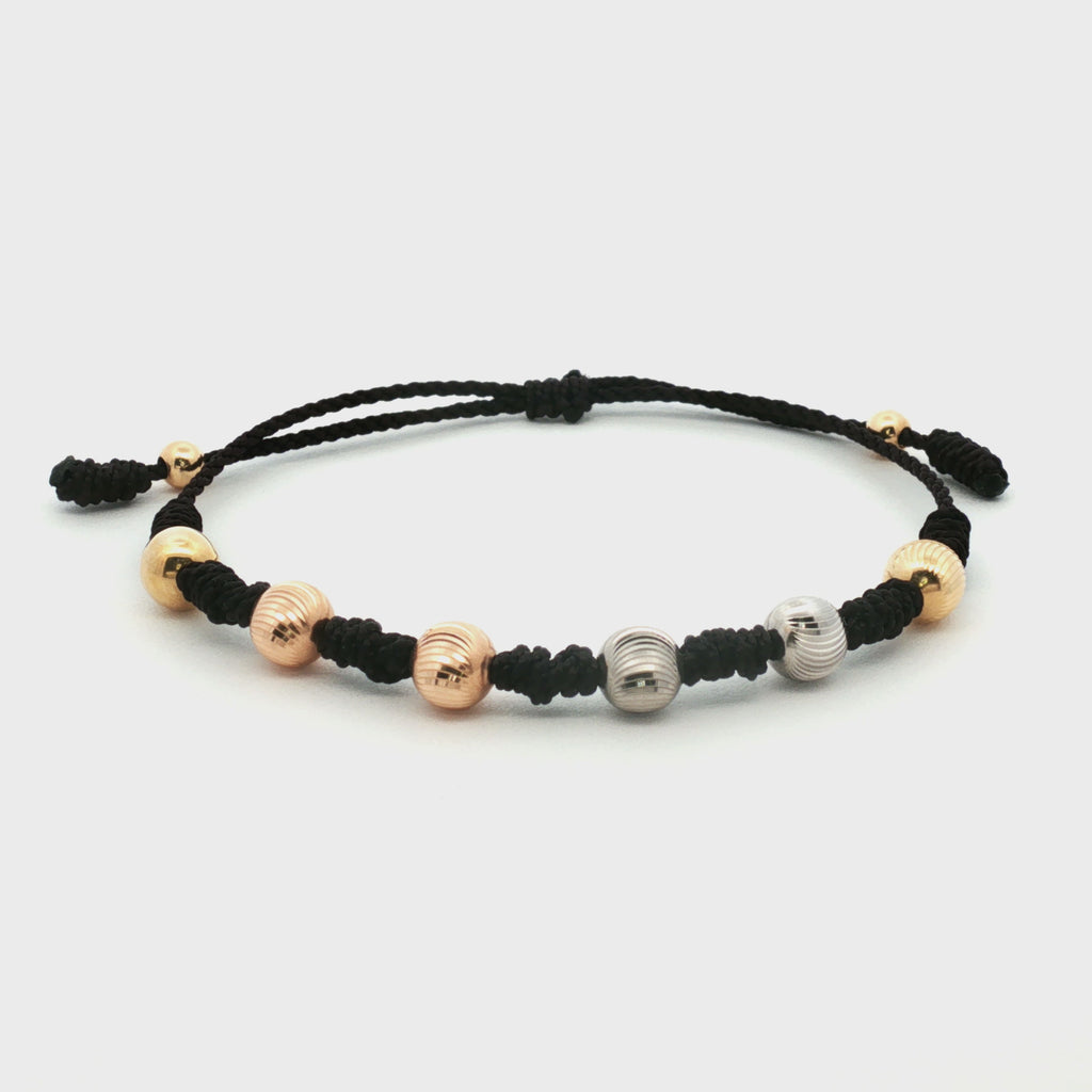 PULSERA HILO NEGRO TRES OROS